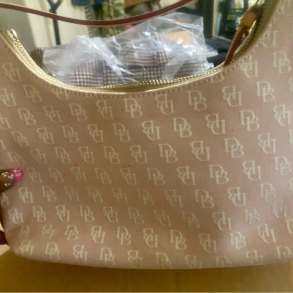 Dooney & Bourke Handbags - Pink small Dooney shoulder bag good condition